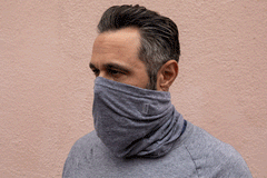 gif of a model pulling down the heather grey gaiter