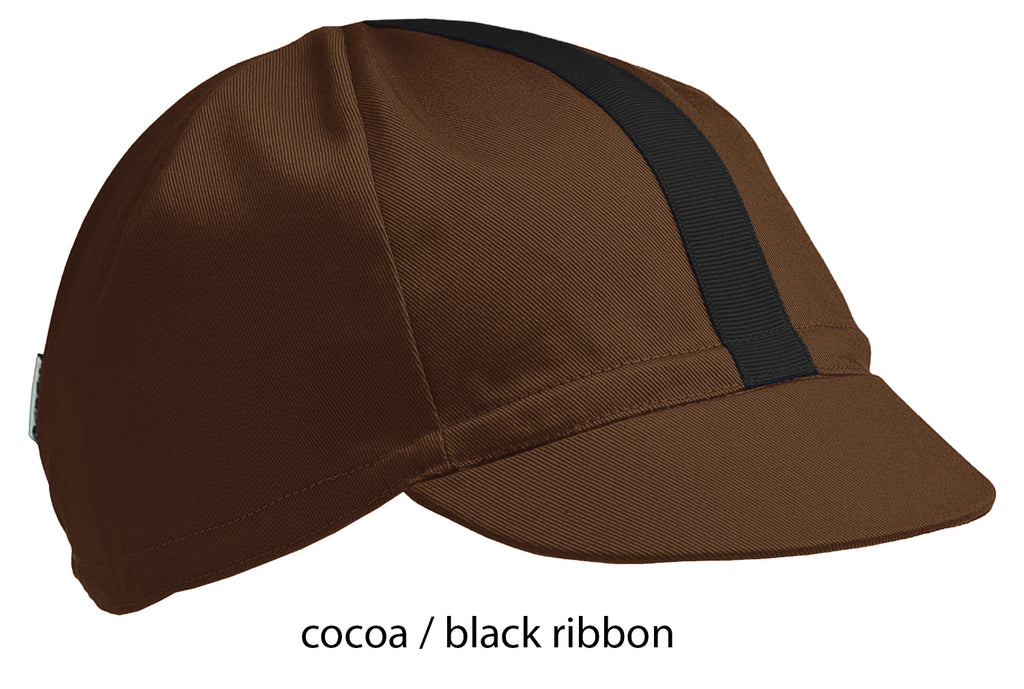 flatshot of our cocoa 4 panel cotton cap with a black ribbon