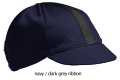 flat shot of our navy 4 panel cotton cap with dark grey ribbon