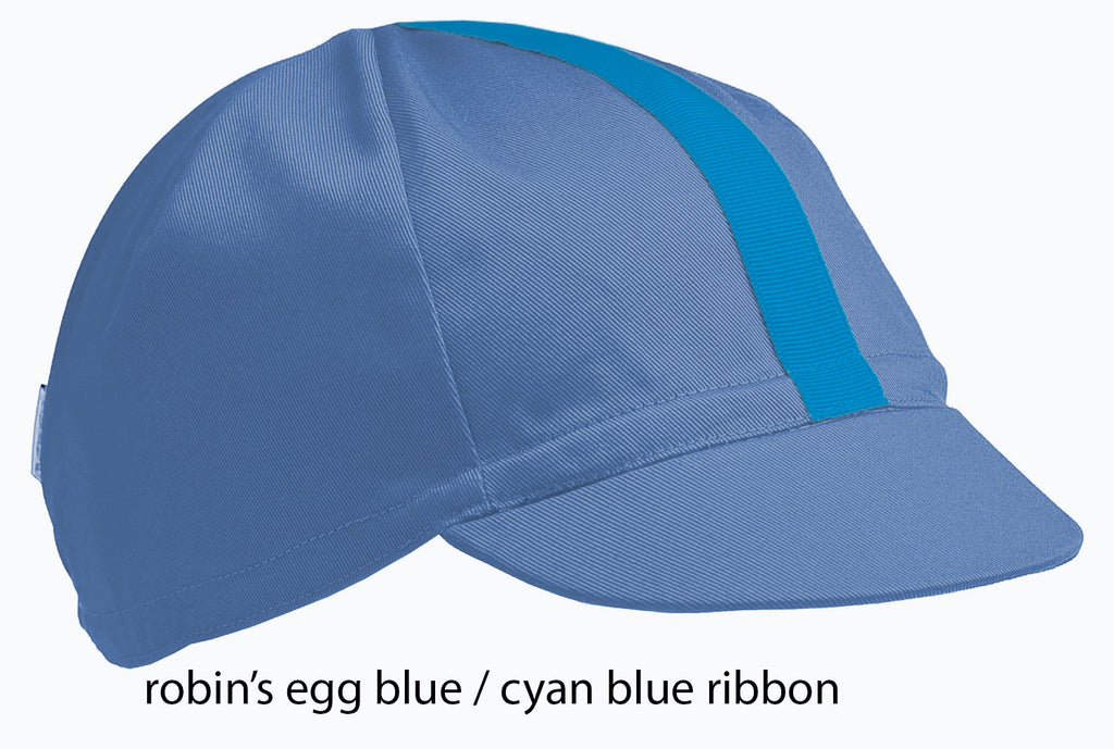 flat shot of the robin's egg blue 4 panel cap with cyan ribbon