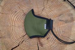 flat shot of the organic summer cotton mask in olive