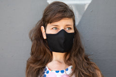 muriel is wearing the organic summer cotton mask in black
