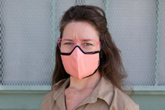 Muriel is wearing the mid-summer cotton mask in sherbet