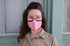 Muriel is wearing the mid-summer cotton mask in cotton candy