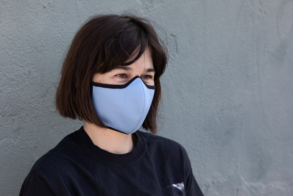 roxy wearing the organic summer cotton mask in robin's egg blue