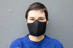 Roxy wearing the 3 layer black wool crepe mask in the adult fit.