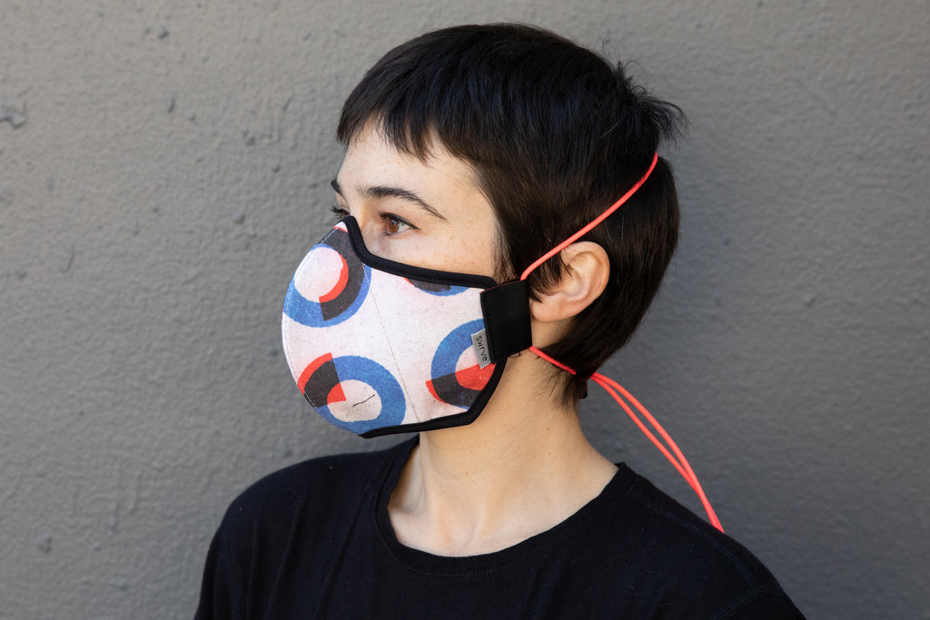 roxy is wearing the bauhaus cotton mask in circles