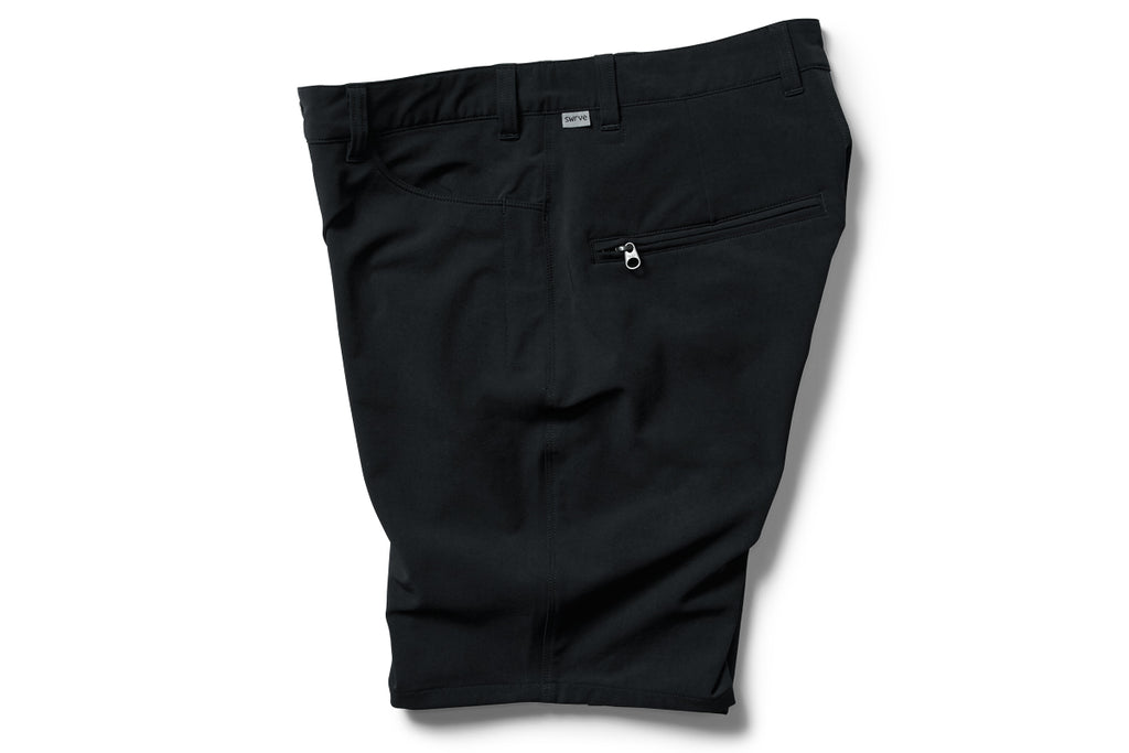 flat shot side details of the TRANSVERSE trouser shorts in black
