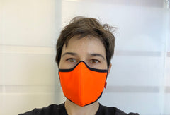 roxy is wearing the fluorescent orange mask.