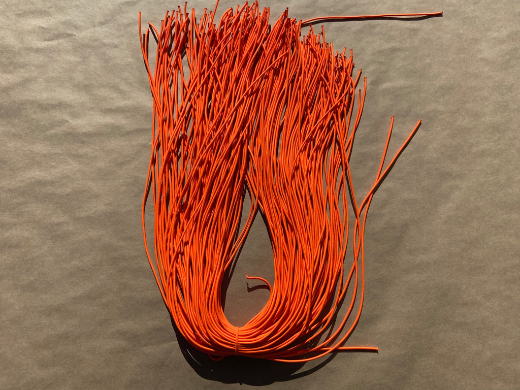 flat shot of our mask color cord in safety orange