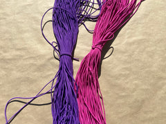 flat shot of our mask color cords in purple and fuchsia