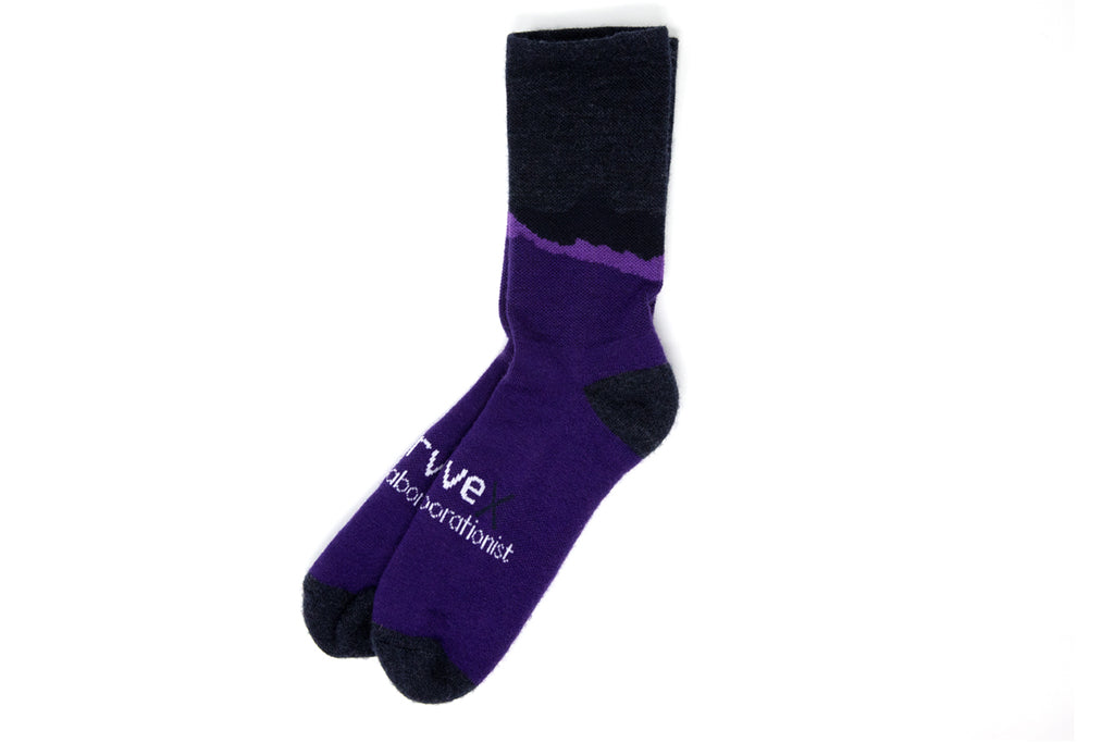 flat shot of the swrve x the Collaborationist merino sock in obsidian